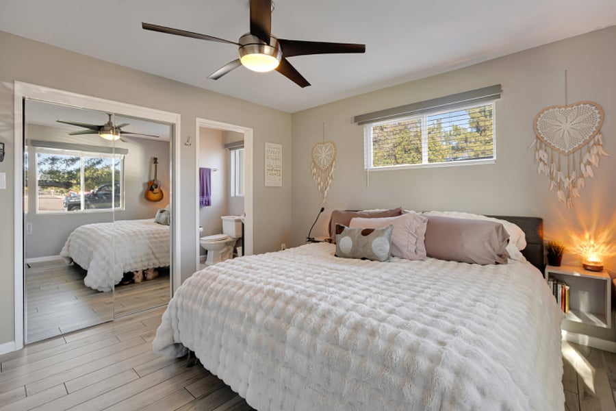Primary bedroom w/king bed, memory topper, organic non-toxic mattress, sunrise views and blackout shades
