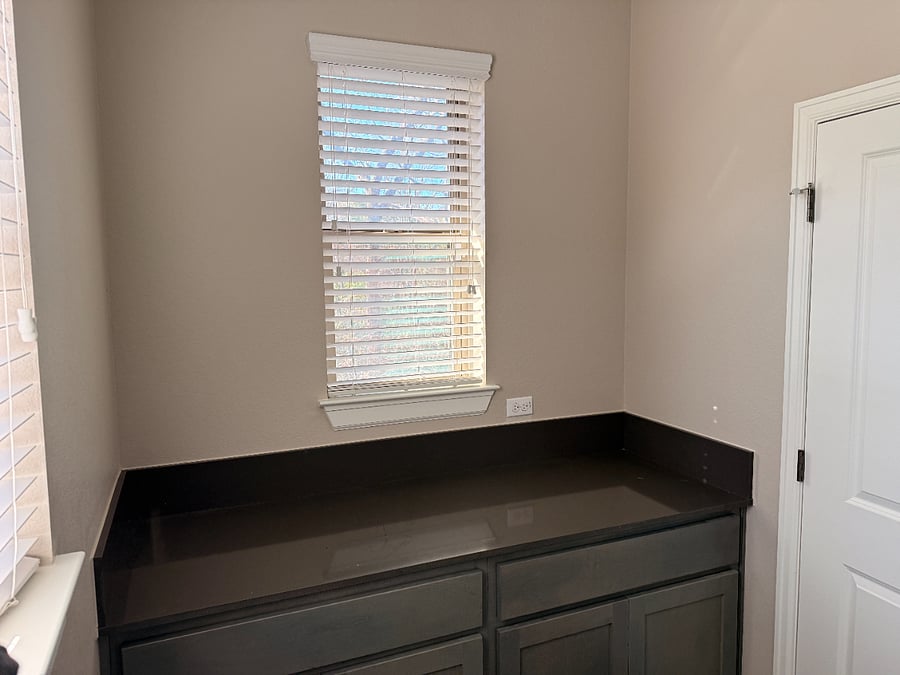 cabinet and countertop space in laundry room
