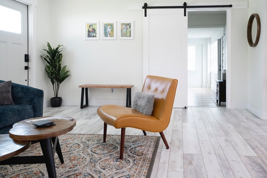 Relax in our conversation area! 
Barn door offers privacy to the Screening room. Fort Myers Florida home.