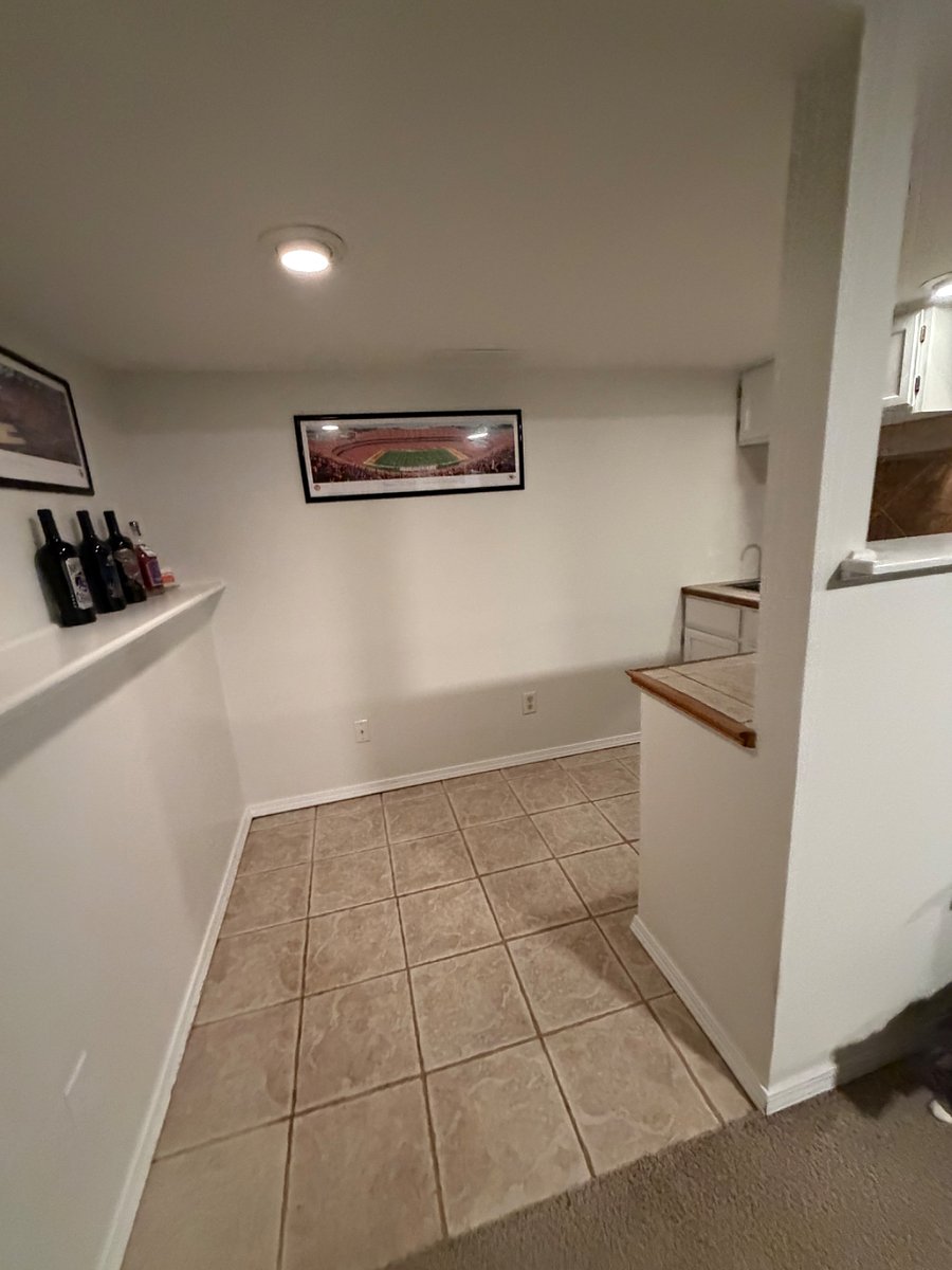 Downstairs bar area with mini fridge