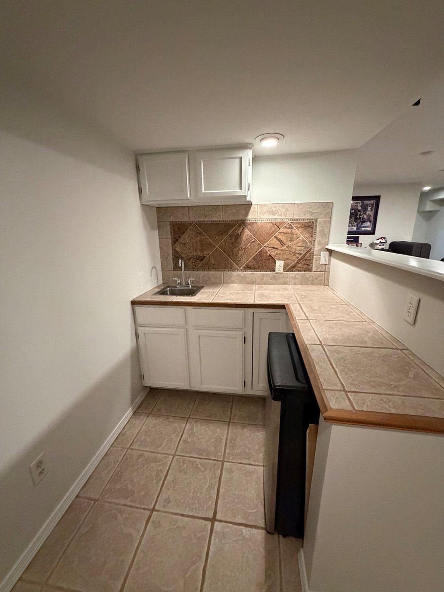 Bar area with mini fridge