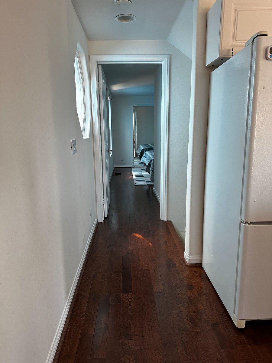 Hallway from kitchen to second floor bedroom