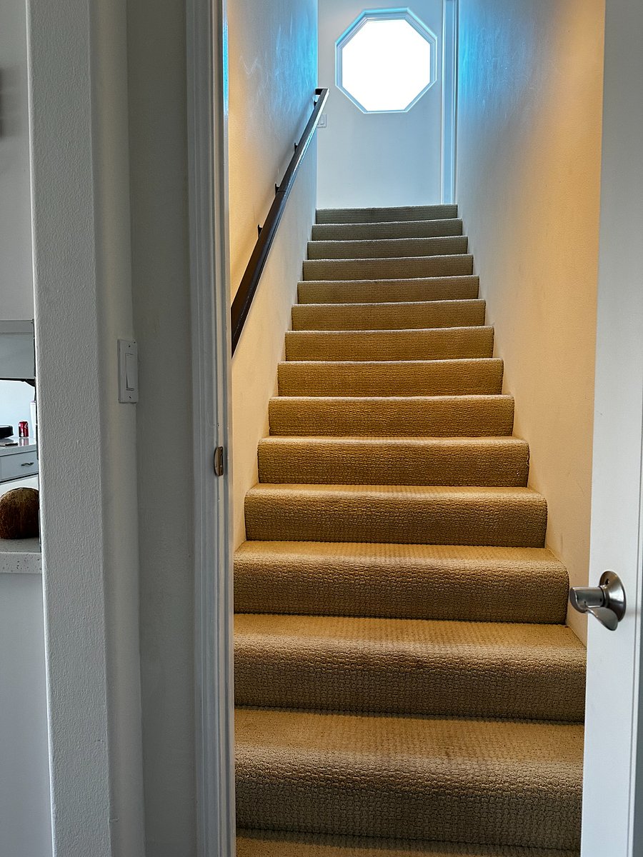 Stairs from second to third floor