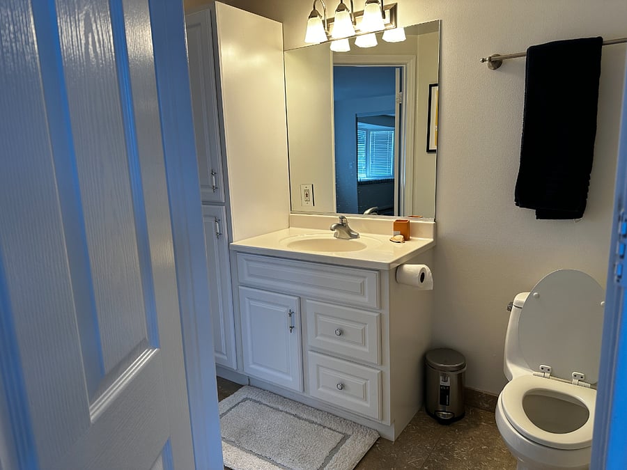 Second floor jack and jill bathroom connecting office and bedroom