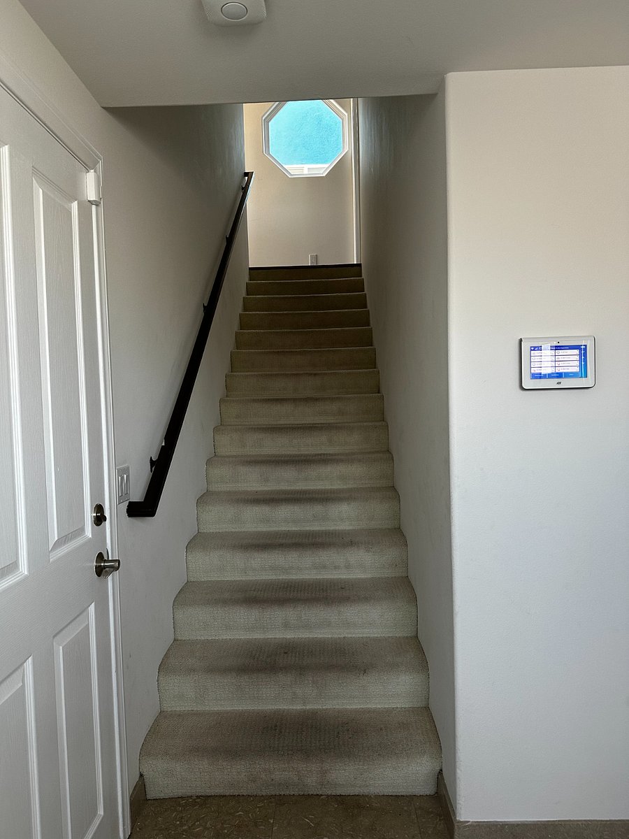 Stairs to second floor from entry