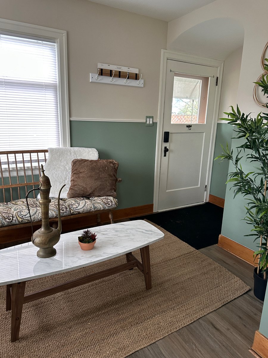 Main Floor - Breakfast Nook off of Farmhouse Style Kitchen Opens to Fenced Back Yard & Porch