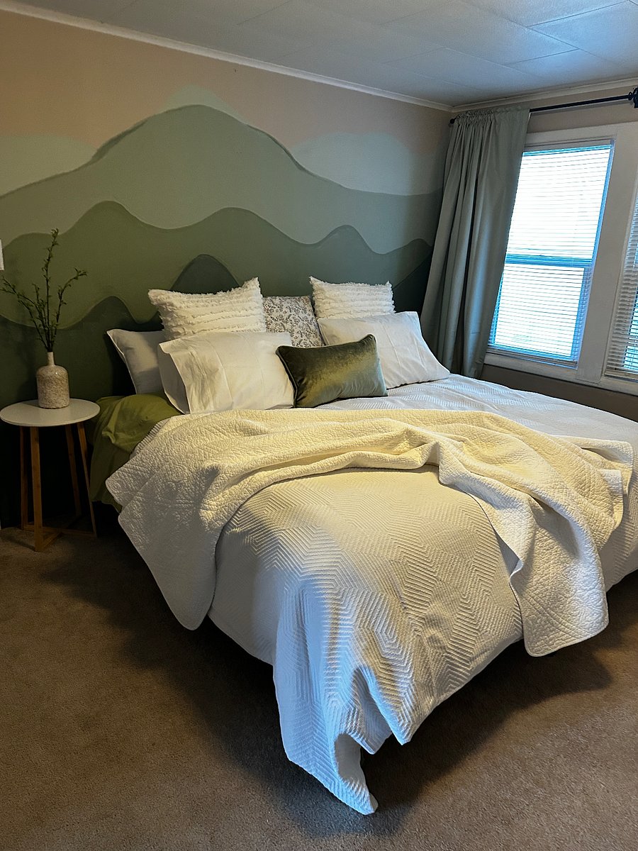 3rd Bedroom Upstairs - King Size Bed.  Room can be closed to the room next door or open via double doors to create one large room or adjoin a 'parent and children's' rooms.