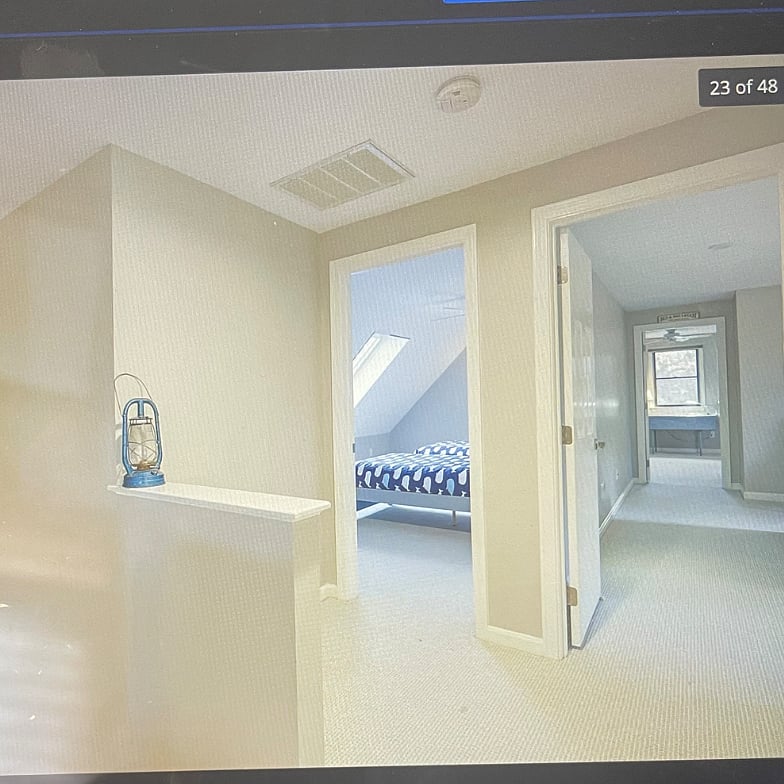 At the top of the stairs. Bedroom is on the left. Private space.
