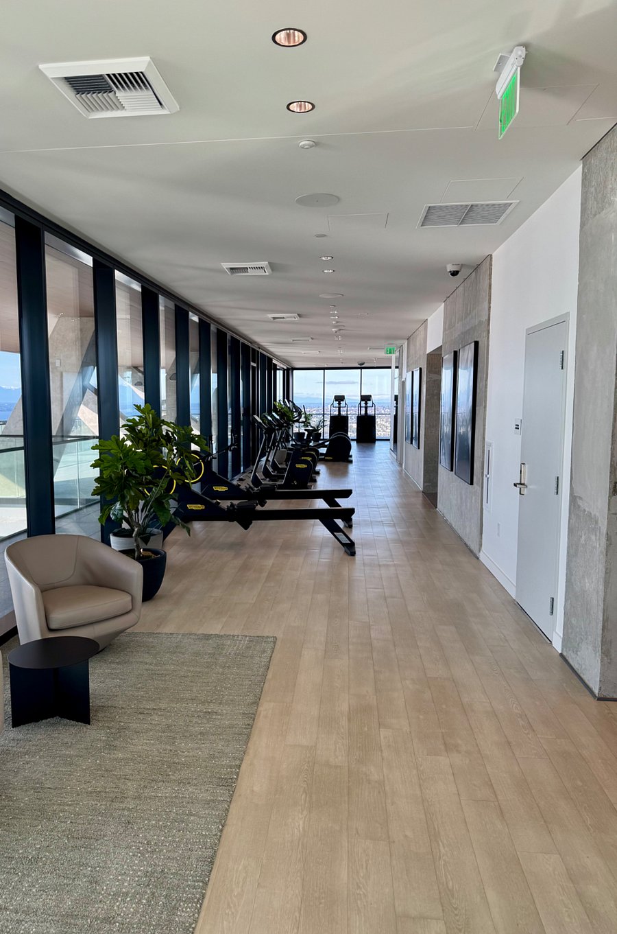 Gym is surrounded with top to floor windows providing 360 degrees views
