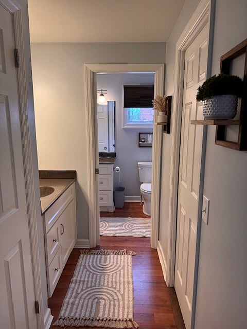 2nd vanity private area off primary BDR pocket door open