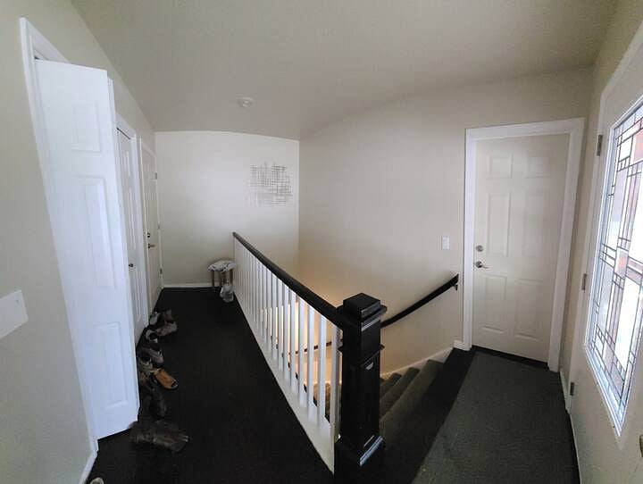 shared front entryway. The downstairs is how the basement tenant Kelsie accesses the basement from outside. The two white doors in front entryway can be deadbolt locked from rental-side.