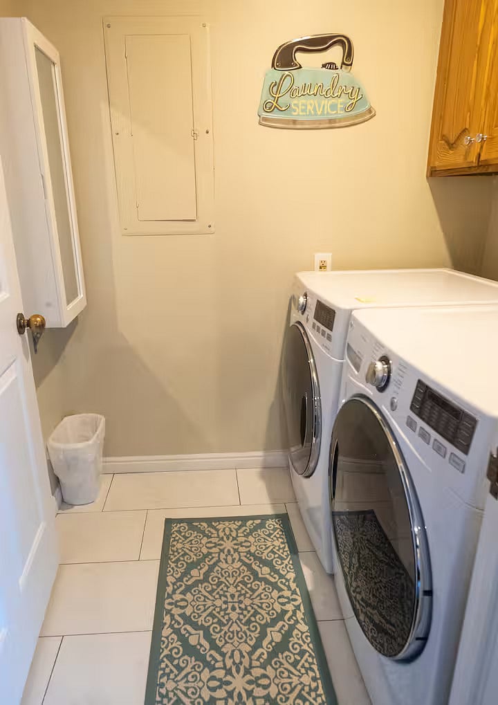 washer and dryer in room next to kitchen in-unit