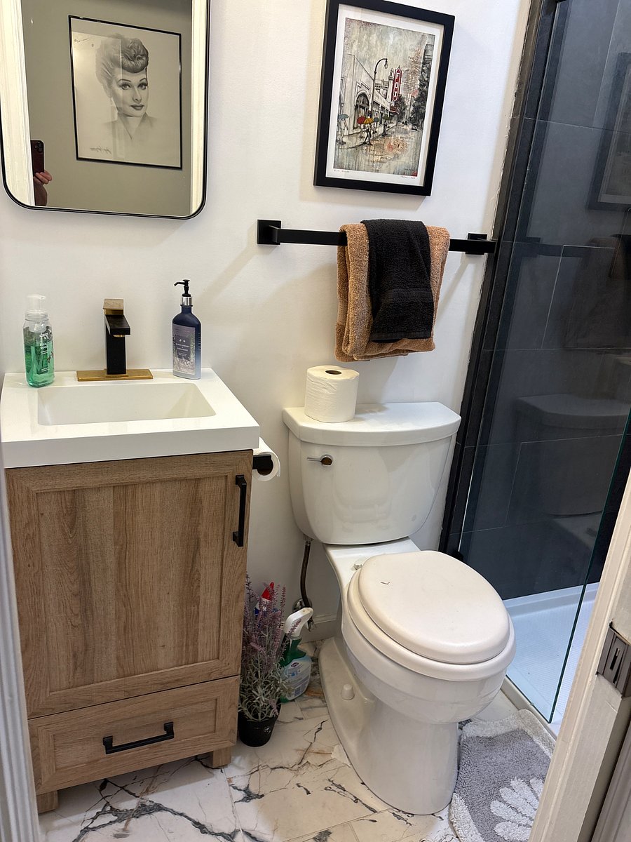 Bathroom with drawer and under cabinet space 
