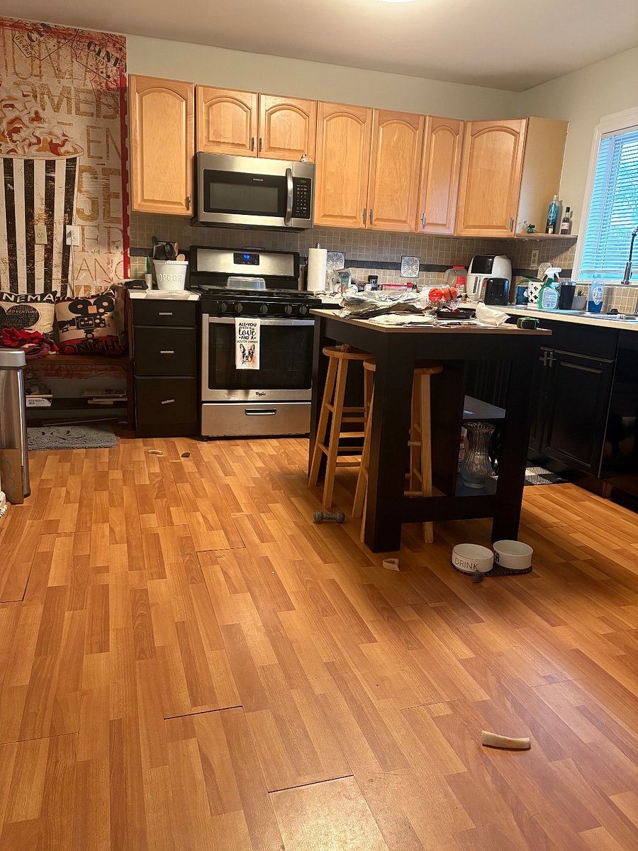 Kitchen. Island has 2 stools under for seating. No junk will be there. 