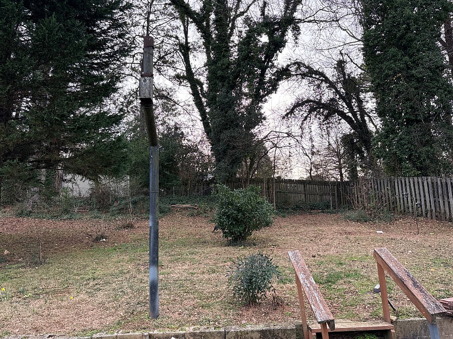 Top tier of backyard. Lots of flowers in the spring 