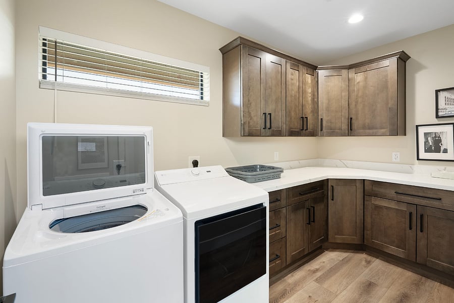 Make extended stays an absolute breeze with this massive, ultra-functional laundry room & secondary prep zone. Designed to handle the needs of large families and groups, this high-utility space ensures you can keep countertops entirely clutter-free.