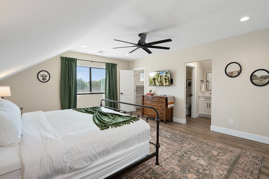Designed as a self-contained retreat, this oversized space gives guests direct access to a private en-suite bathroom and a dedicated closet area without ever needing to step out into the main house.