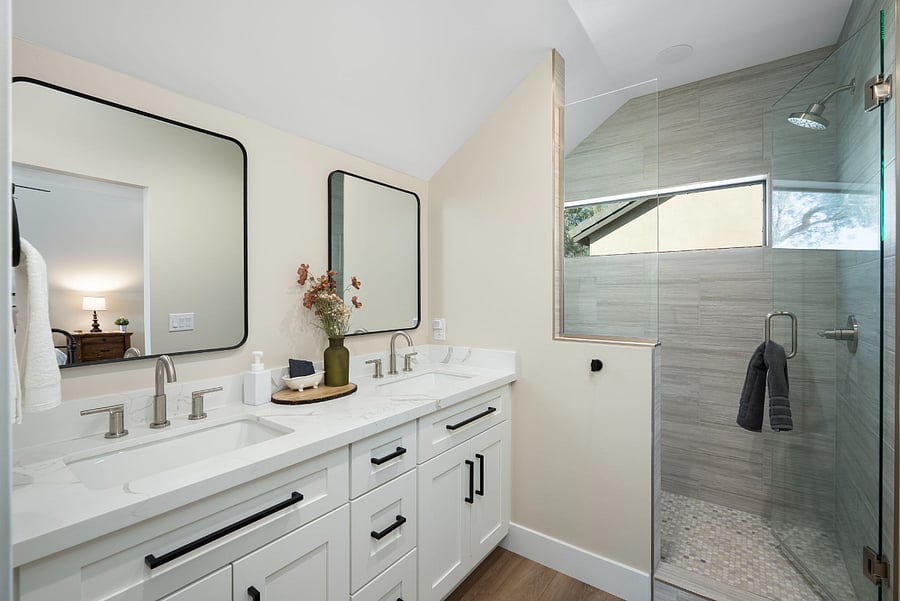 Step into a beautifully designed master bathroom that feels like a private boutique hotel retreat. This bright and spacious en-suite combines high-end modern amenities with an elegant layout, making it the perfect spot to refresh and pamper yourself.