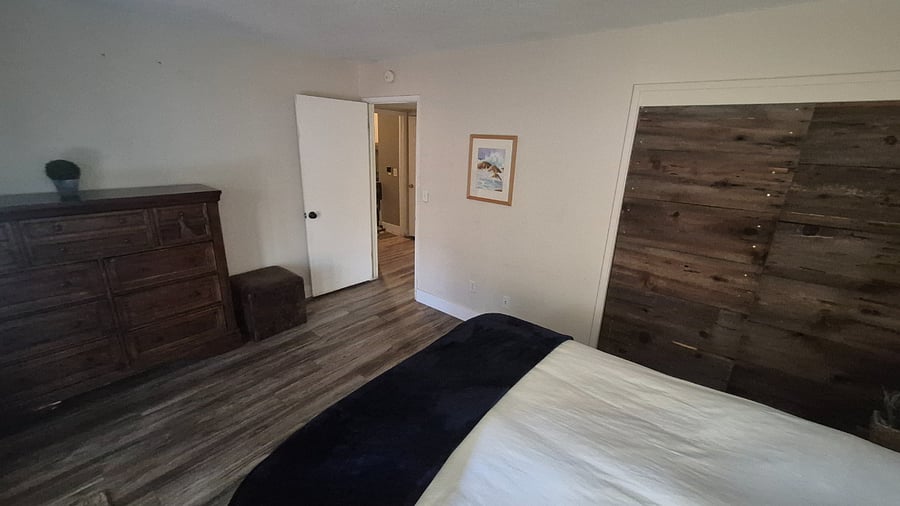 Downstairs Large Bedroom w/ covered patio