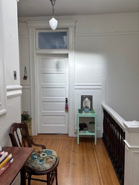 Natural light from skylight, beautiful original Victorian woodwork and wainscoting, well maintained and loved houseplants.