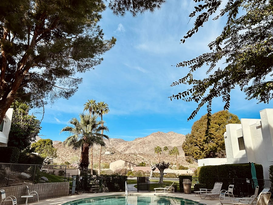 Pool area with a beautiful view of the mountains just steps from your backdoor.
