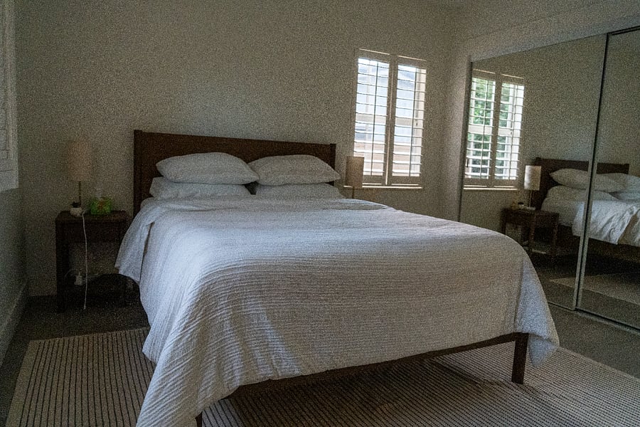 Primary bedroom towards the front with a dresser.