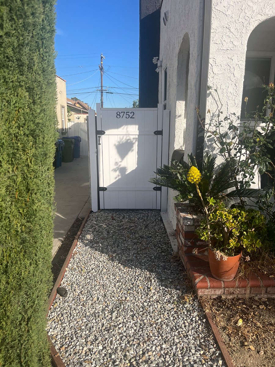 Left side gate leading to rear