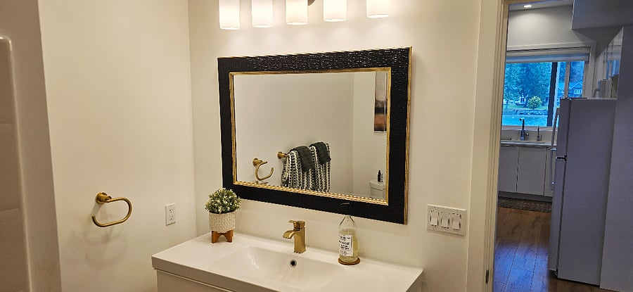 Full bathroom with tile flooring, excellent lighting, vanity with lots of storage