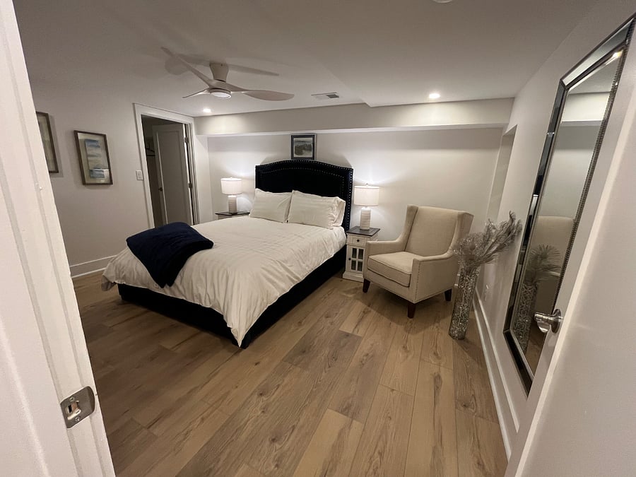 New queen bed and mattress, all new bedclothes. Both bedside tables have electric and USB outlets.