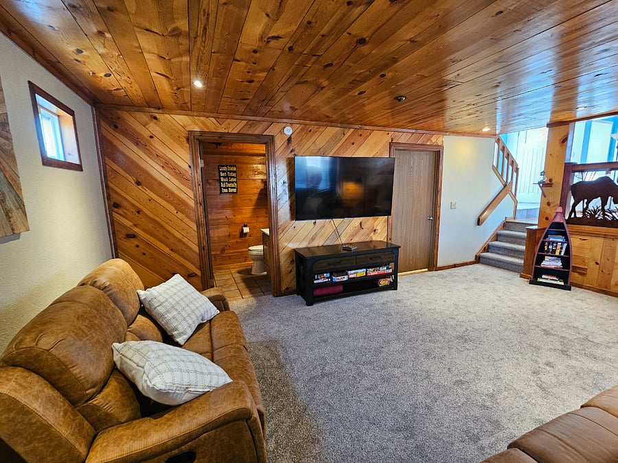 Large screen Samsung Smart TV, board games & puzzles for all ages. Attached Half bath and laundry.