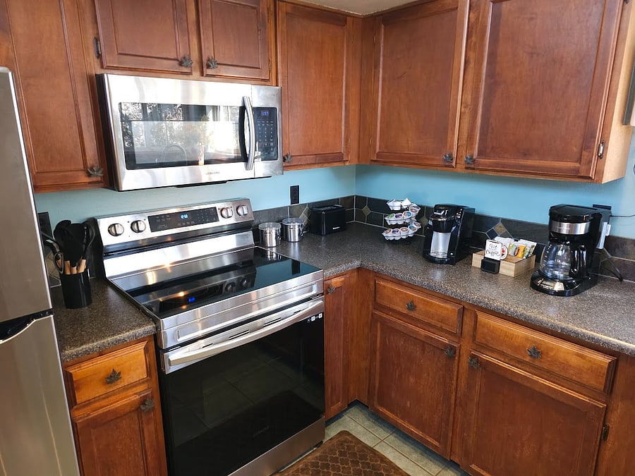 Electric stove, microwave, Keurig and 12 cup coffee pot