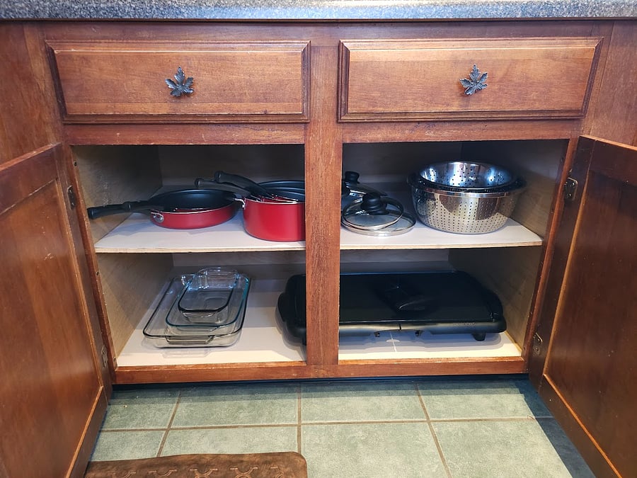 Pots, pans, baking dishes, pizza pan, strainer