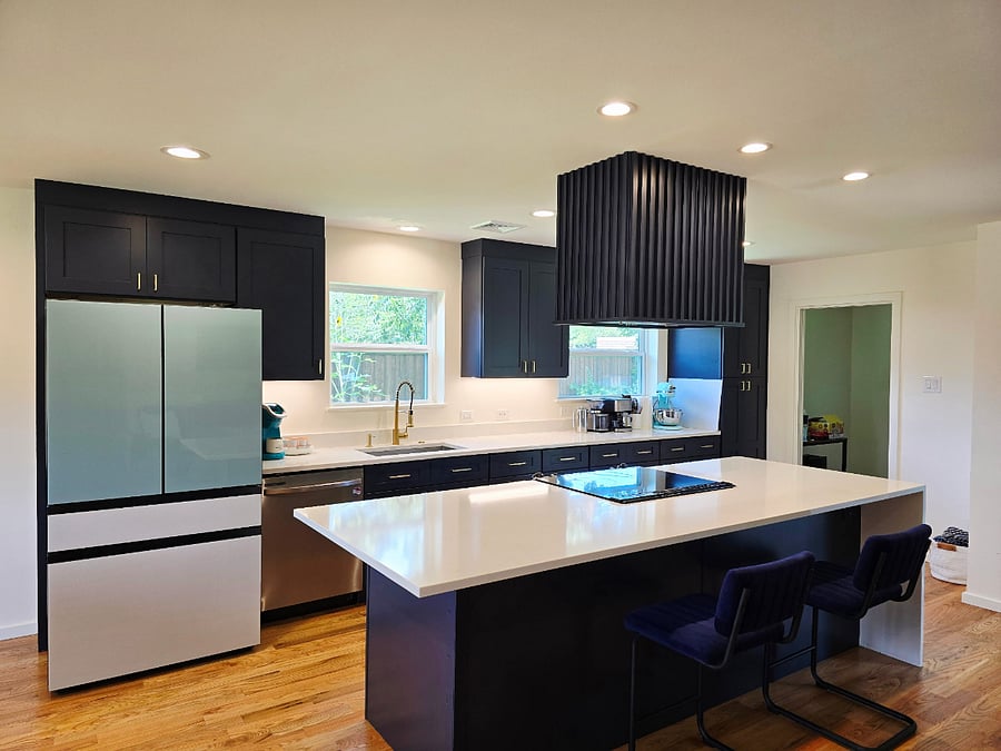 Kitchen with new appliances and quarts countertops