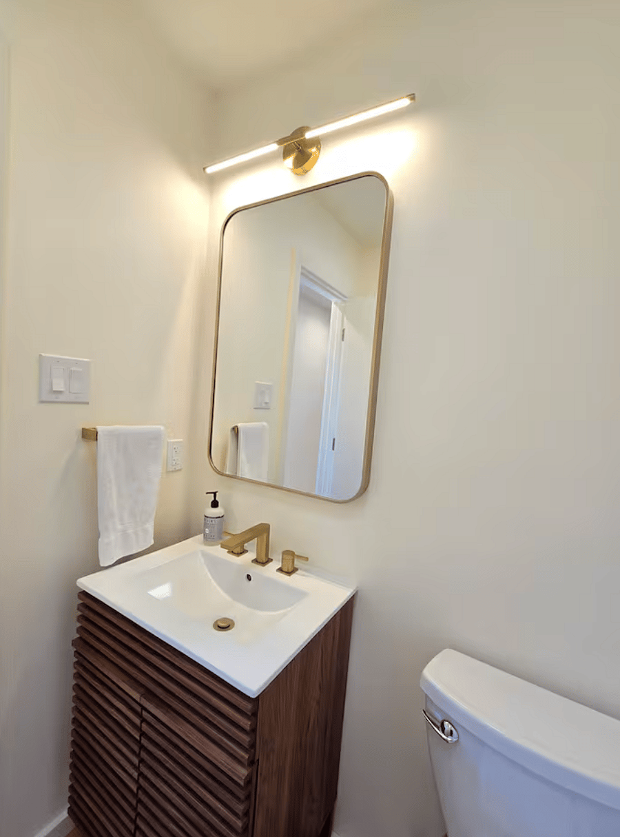Powder bathroom near living room