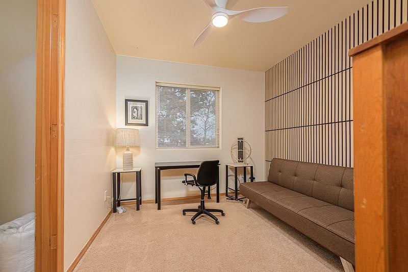 Middle bedroom set up as an office also has a futon couch, dresser, closet and blackout blinds.