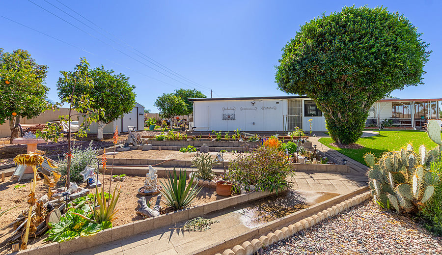 Side yard from AZ room now offers a pergola sitting area and shade. photos are pending 