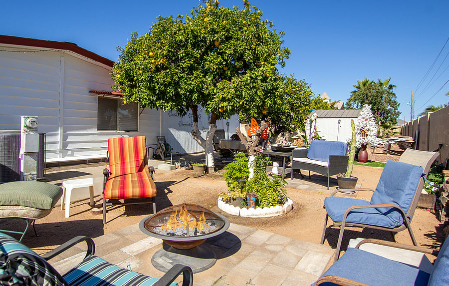 Fire pit area and pet area. Pet area has been updated and now provides shade over the grass Christmas tree has been removed 