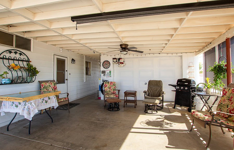Carport with main entrance to the house