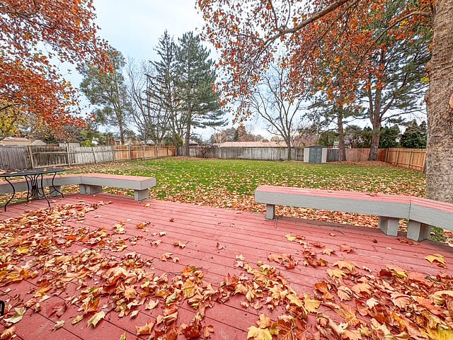 Patio with built in seating, a perfect spot for outdoor entertainment. This space also features a BBQ for outside cooking and entertainment.