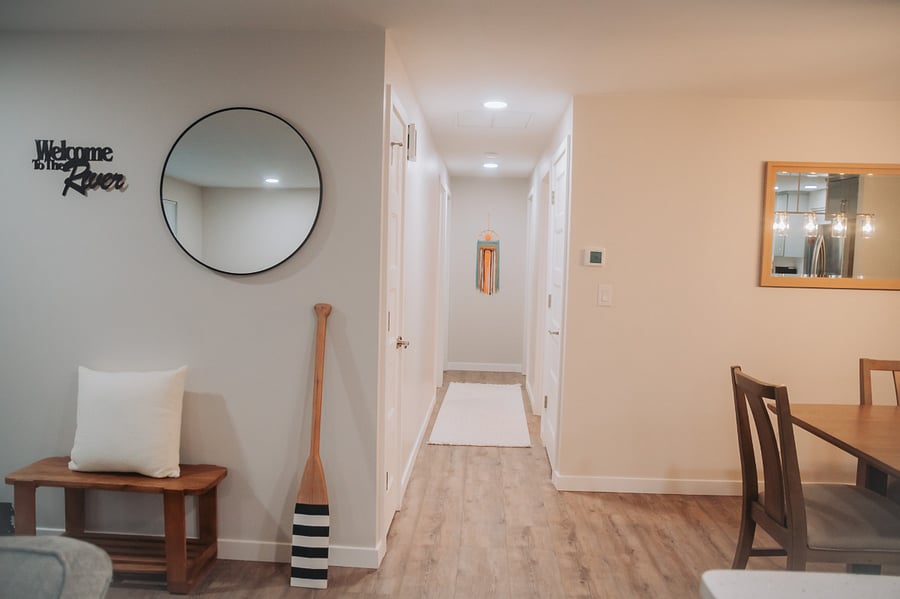 The main hall: leads to the master bedroom with master bath, 2 guest bedrooms, a closet for linens and a shared hall bathroom.