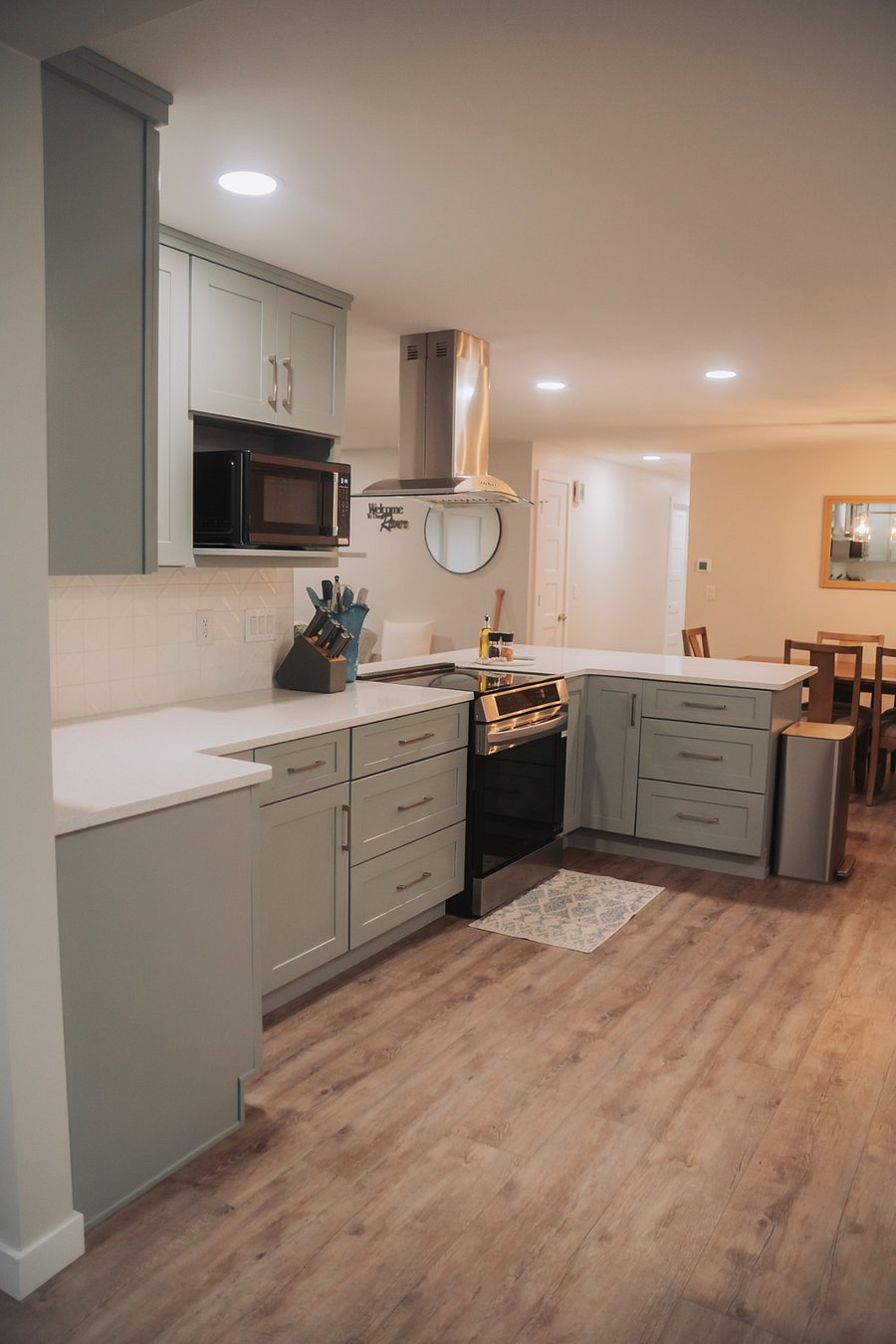 Another view of the new kitchen and back to the main hallway off the dining area. Our kitchen is stocked with all the plates, utensils and cookware needed.