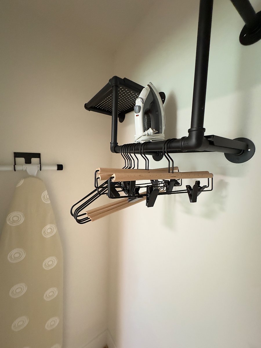 Master closet hangers and ironing board