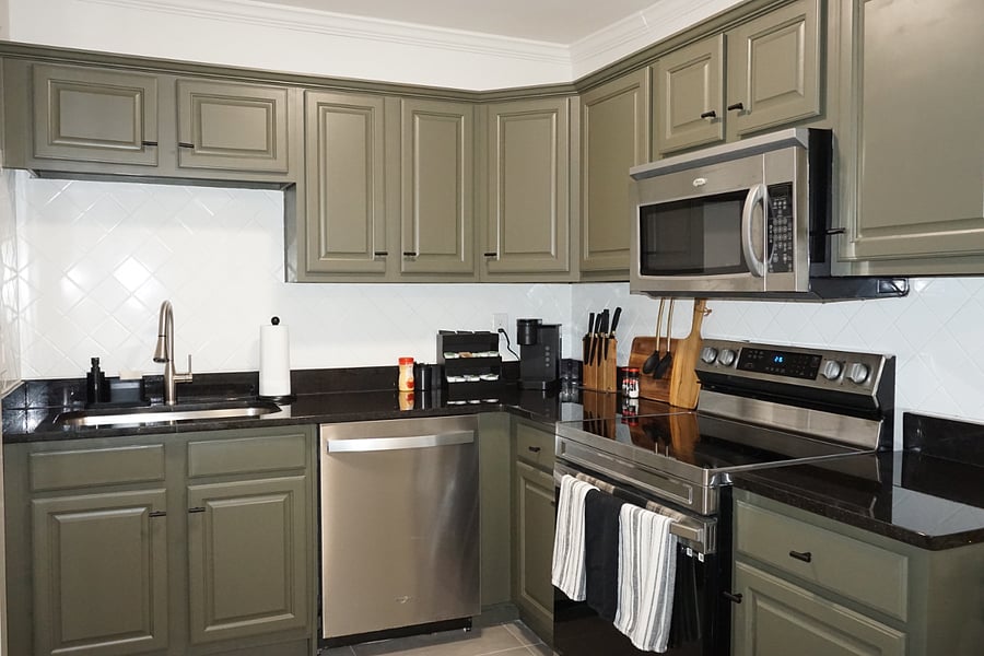 Kitchen with microwave, stove, and dishwasher.