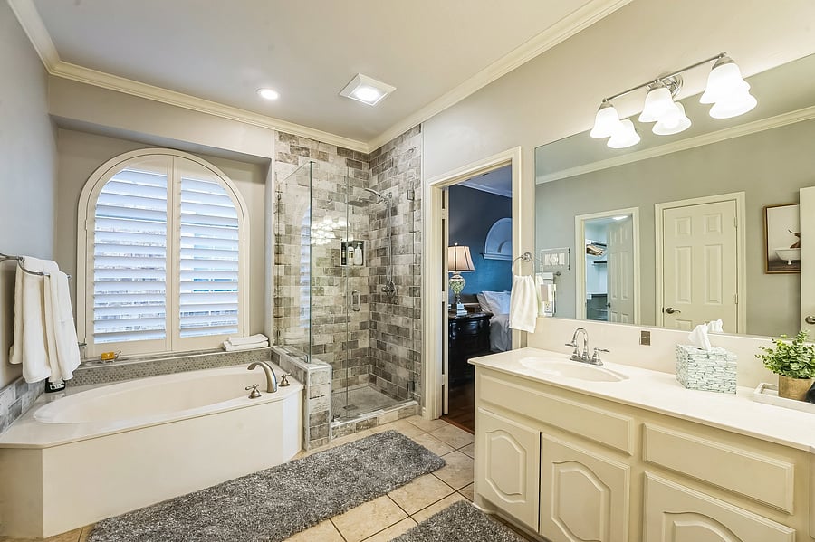 Master bath with soaking tub and glass shower