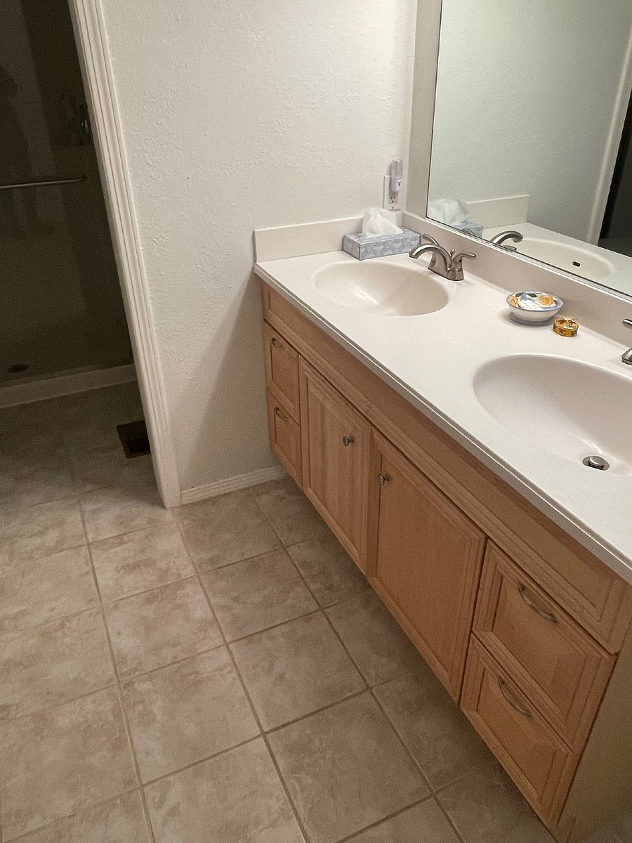 Primary bathroom.  Spacious closets with built in drawers.  Walk in shower with high shower head.  