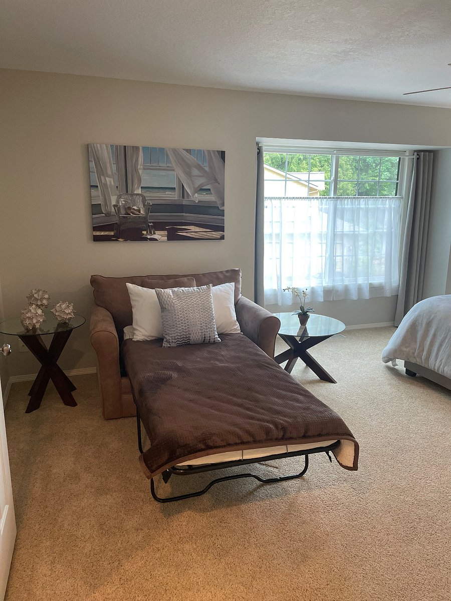 Seat in primary bedroom folds out to twin bed.