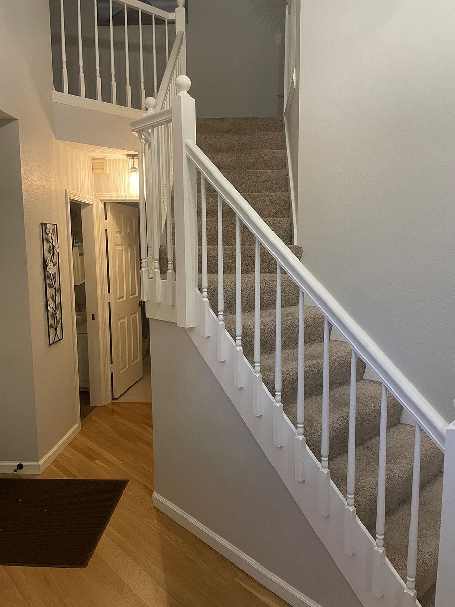 Foyer.  Front door to the left, laundry and garage straight ahead, living room to the right.