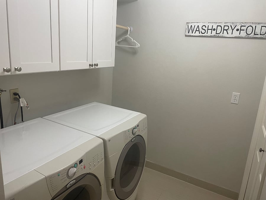 Laundry room to the left of the stairs on the 1st floor.