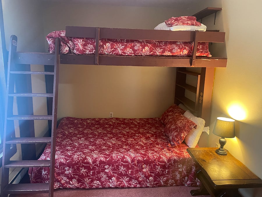 2nd bdrm with a queen on lower level and full bed on loft