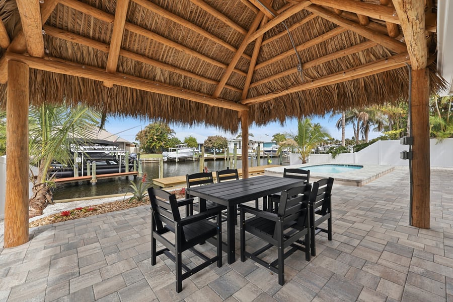 View from Tiki hut looking down canal and down pool 
